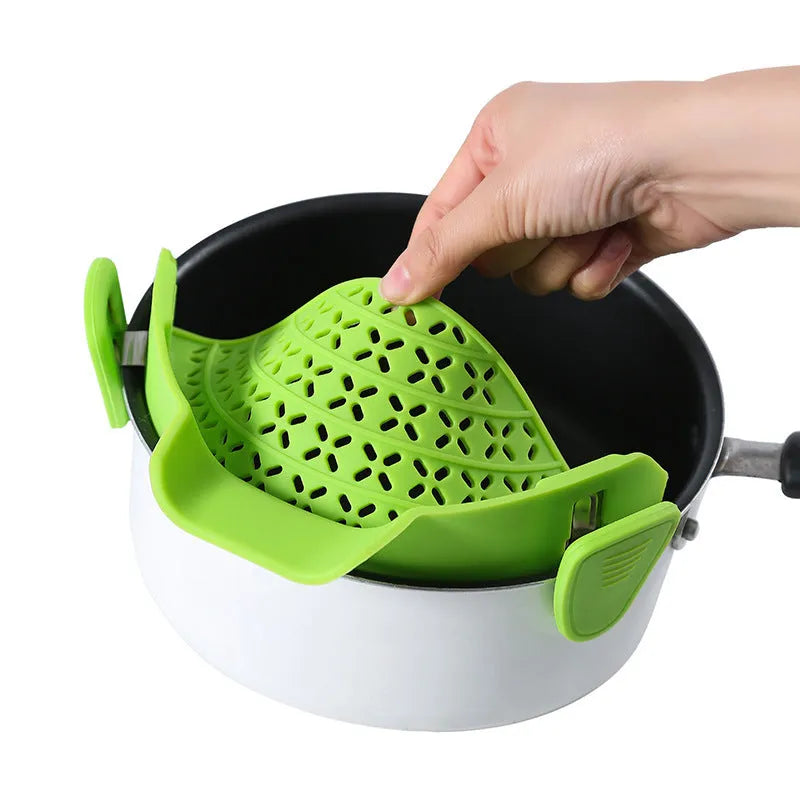 Silicone pot drain stopper kitchen gadget in five colour options on kitchen counter