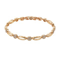Golden copper hollow carved U-shaped women's bracelet showing openwork pattern