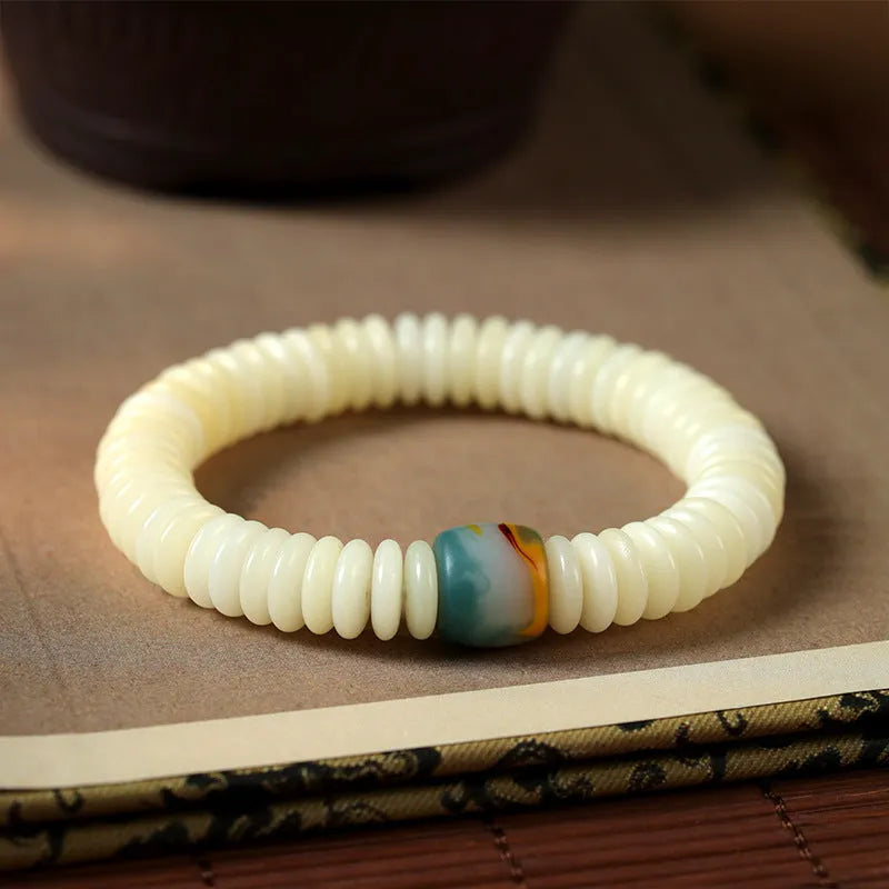 Tibetan white bodhi seed Buddhist bracelet or handheld mala with traditional knotting