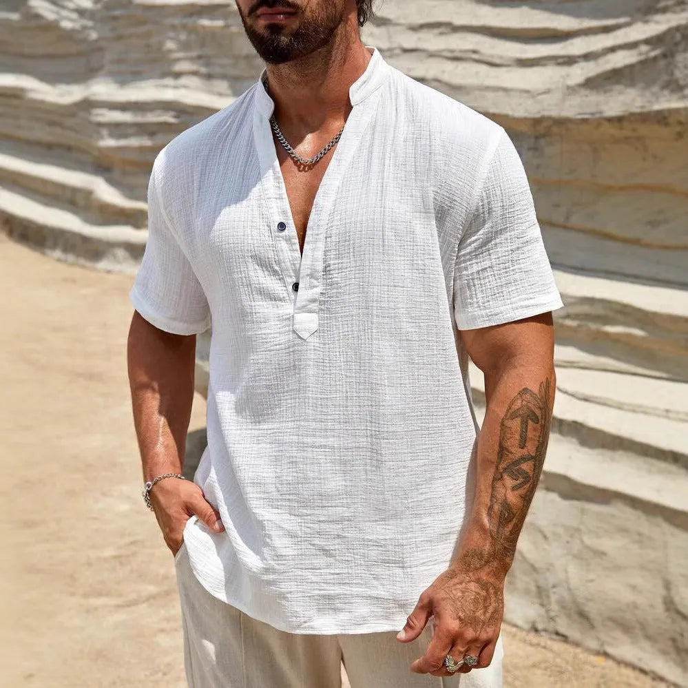 Men's solid colour short-sleeved stand collar casual shirt on a hanger.