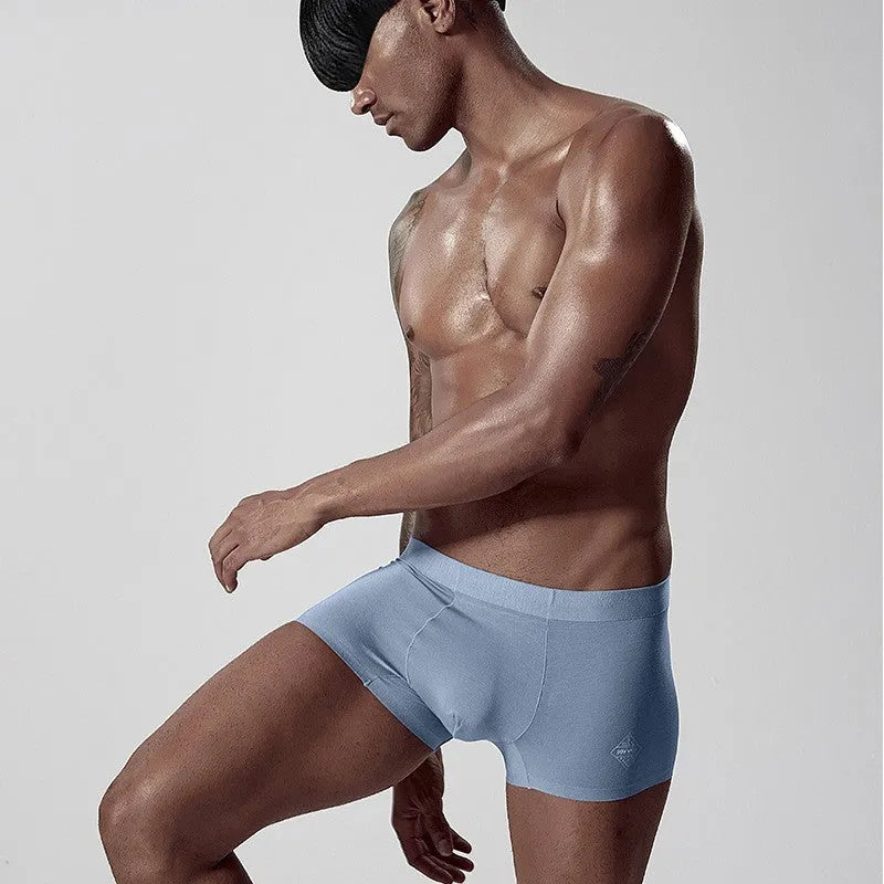 Men's seamless modal underwear in white, pink, green colours showing mid waist fit