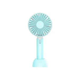 Blue handheld mini USB electric fan with three-speed control on a desktop.
