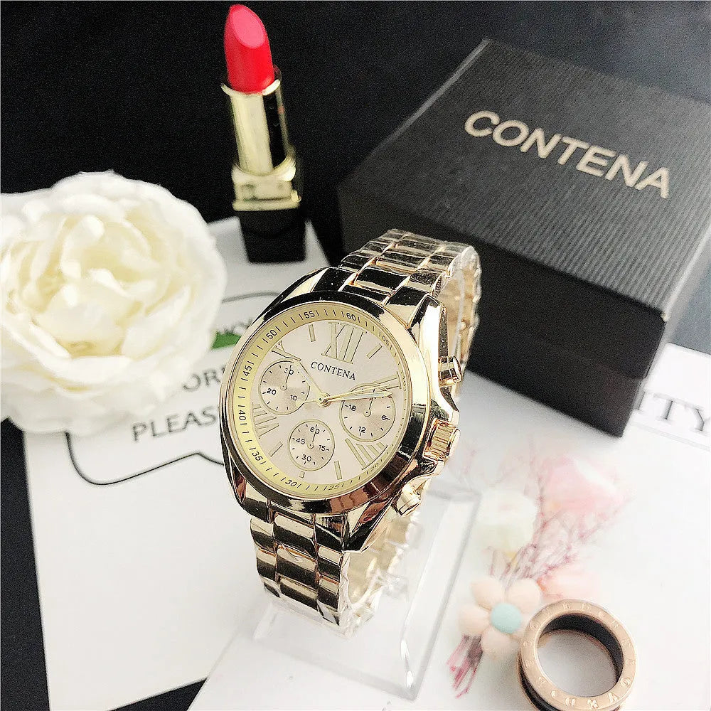 Women's silver rose gold diamond quartz watch with mesh strap, 15mm thick case.