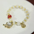 Chinese style women's coloured glaze bracelet with safety lock, windmill and bamboo charms