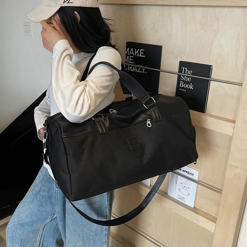 Large capacity oxford cloth messenger bag in black, blue, or khaki colours with breathable lining