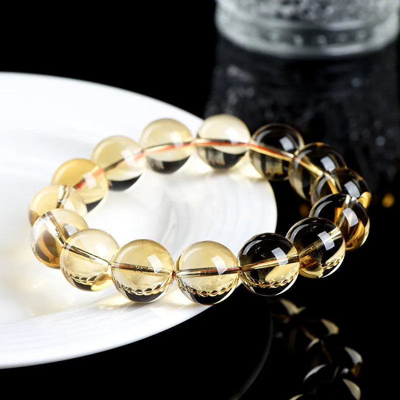 Natural citrine scattered bead bracelet in 7A grade on a wrist, showing polished stones and original design.