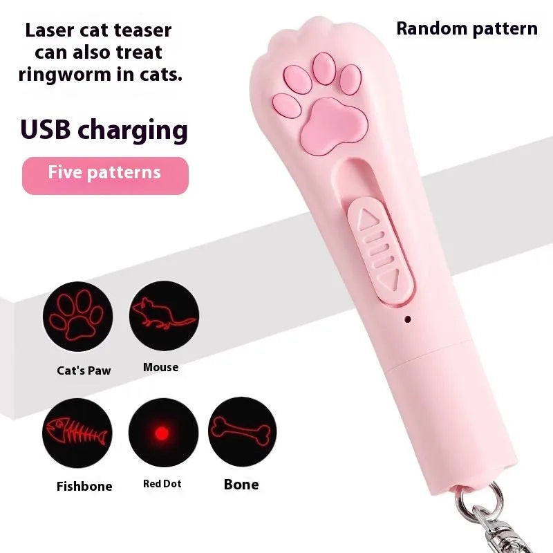Pink self-playing cat teaser wand toy with USB charging cable on a table.