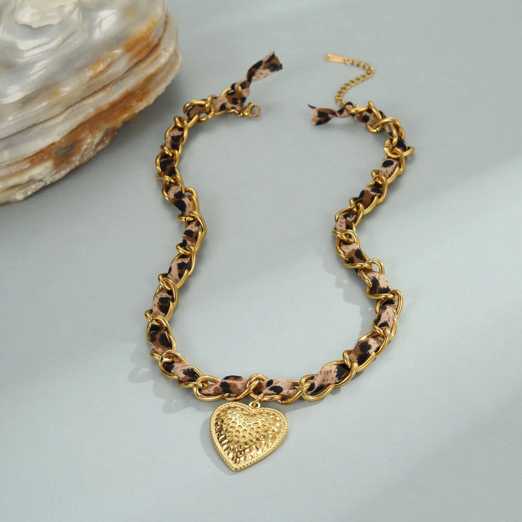 Women's stainless steel leopard love pendant necklace with geometric design and regular chain