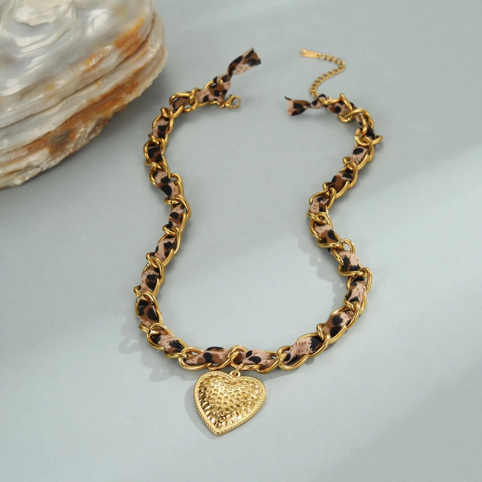 Women's stainless steel leopard love pendant necklace with geometric design and regular chain