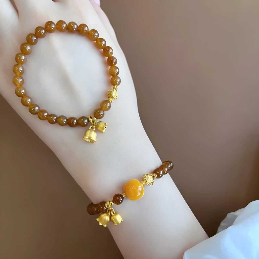 Women's caramel beeswax Lily bracelet with new Chinese style flower design and electroplated finish