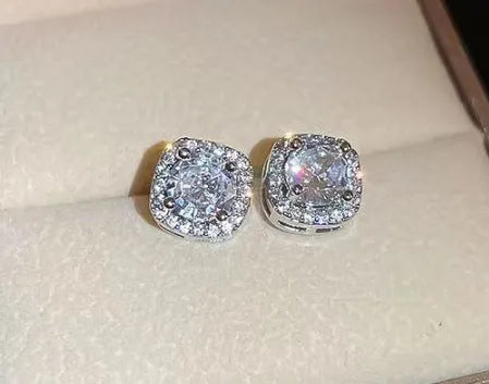 A pair of square geometric diamond-cut earrings for women in silver or gold colour.