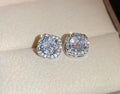 A pair of square geometric diamond-cut earrings for women in silver or gold colour.