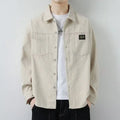 Men's corduroy cardigan style jacket in black, dark grey, khaki, or orange, with long sleeves and ribbed texture.
