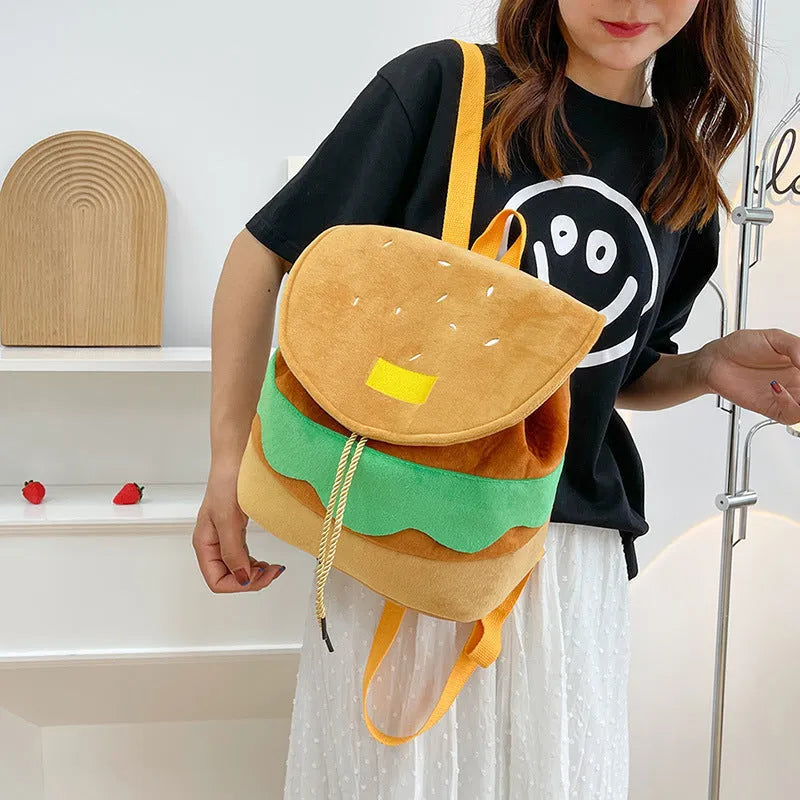 Cute hamburger plush backpack in soft velvet with drawstring closure, cartoon burger design