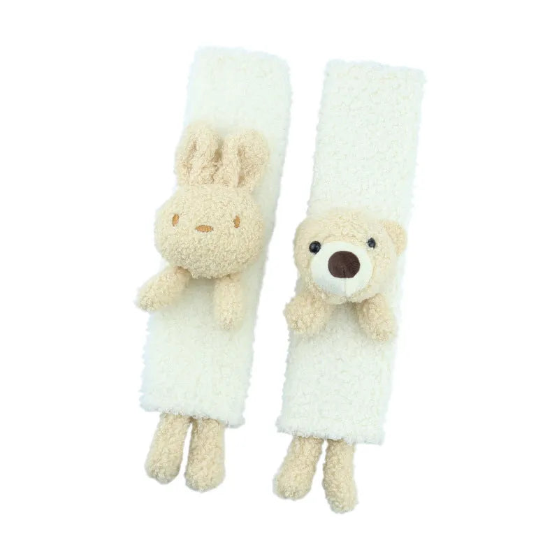 Cartoon plush lamb wool car seat belt shoulder protector in bear and rabbit designs.