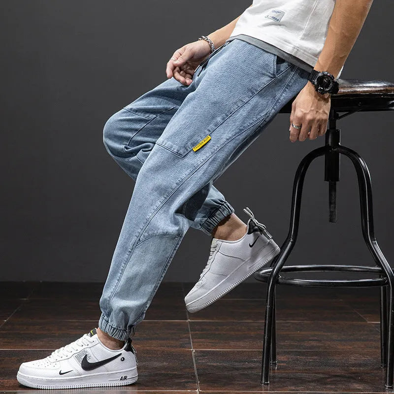 Men's loose cargo jeans in straight leg style with Korean workwear design