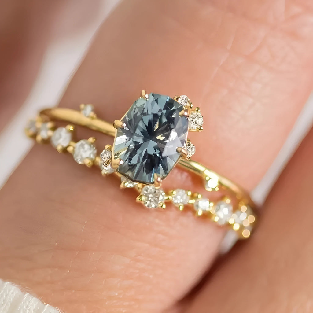 Gold-plated women's ring with green zircon floral design showing side profile