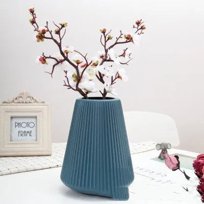 Colourful melamine plastic decorative vase measuring 16cm by 20cm in blue, green, pink and white options