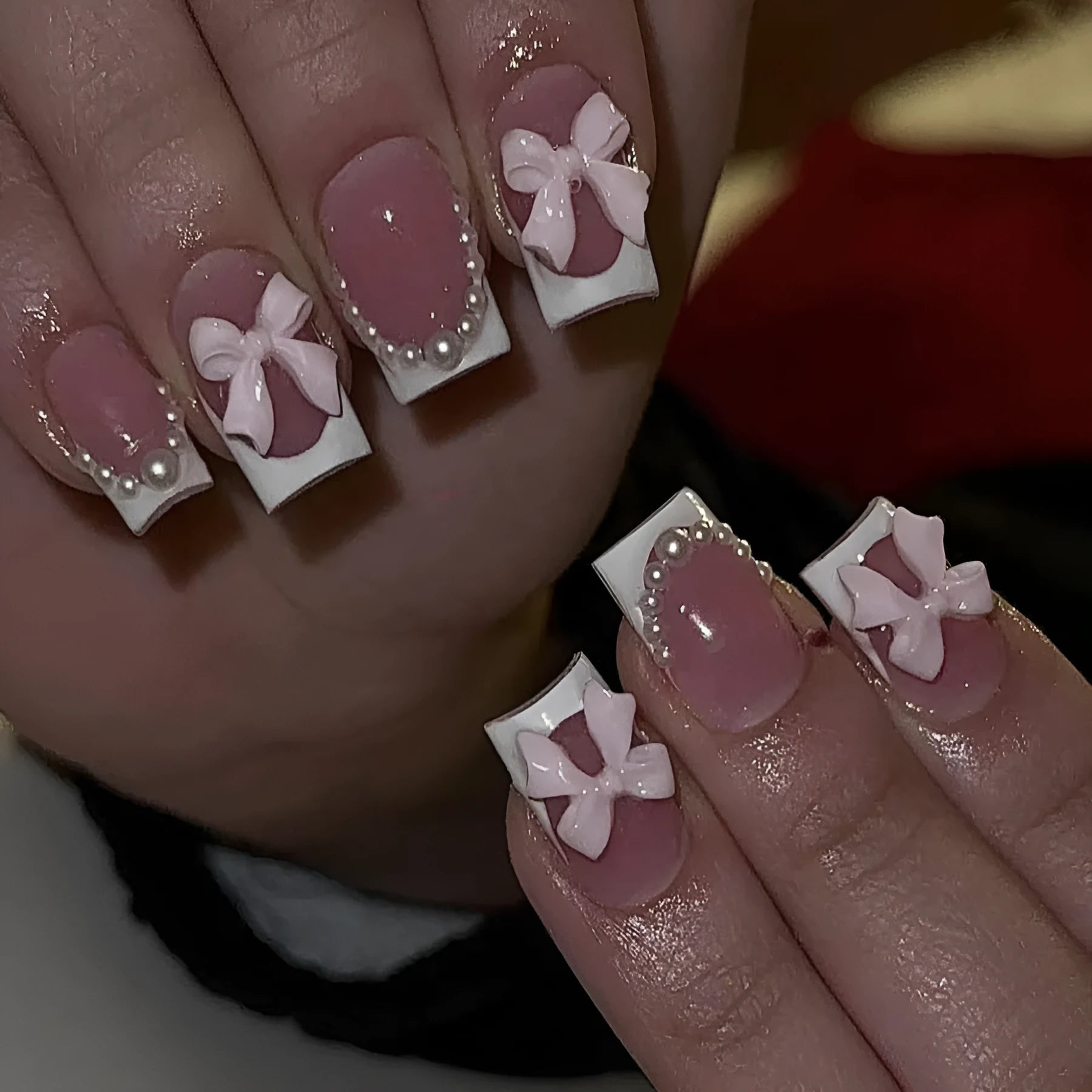 Pack of short white French manicure nail stickers with bow, tulip, and starry sky patterns.