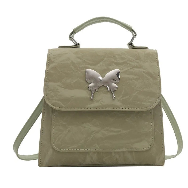 Women's preppy style PU backpack handbag with bow detail in choice of six colours