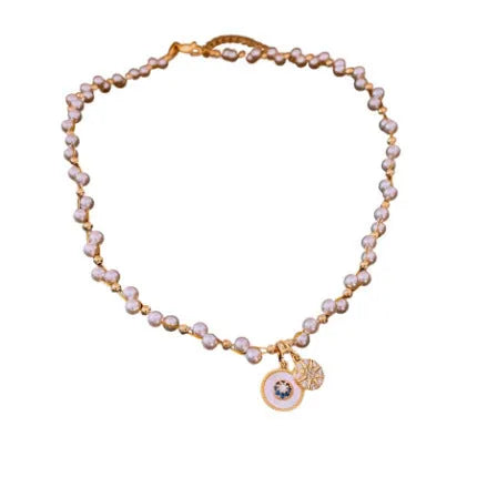 Gold electroplated necklace with round imitation pearl pendant and zircon accents on 41-50cm clavicle chain