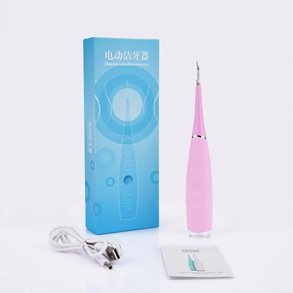 Electric dental scaler with USB rechargeable base, pink colour, compact design for home calculus removal