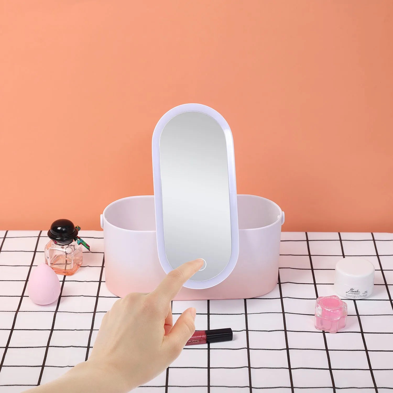 Pink gradient makeup storage box with LED mirror open showing storage compartments and USB charging port