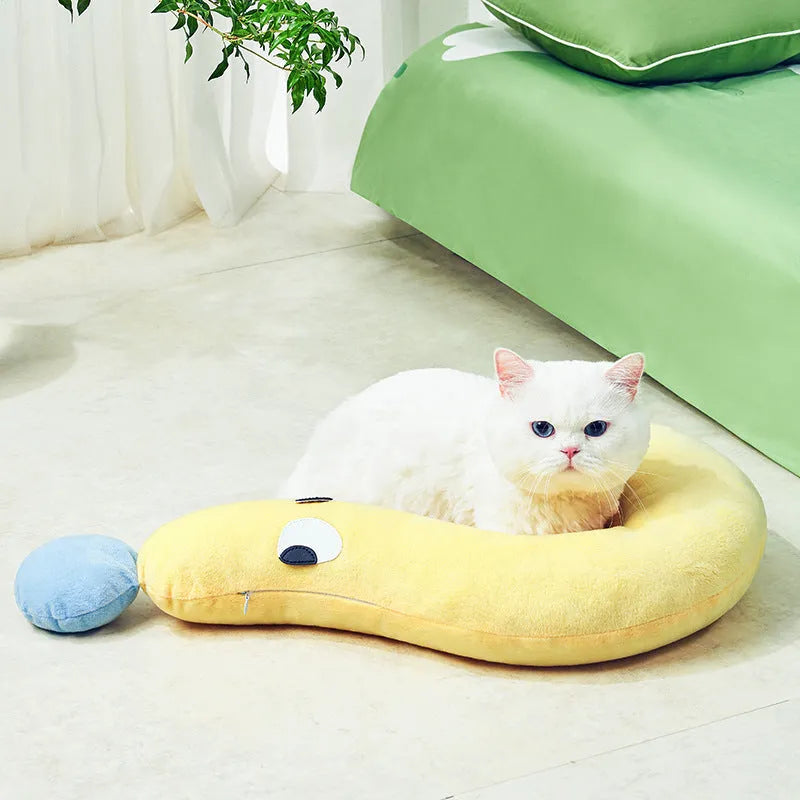 Blue rectangular pet pillow for cats and dogs on a floor, showing its 62cm by 39cm size.