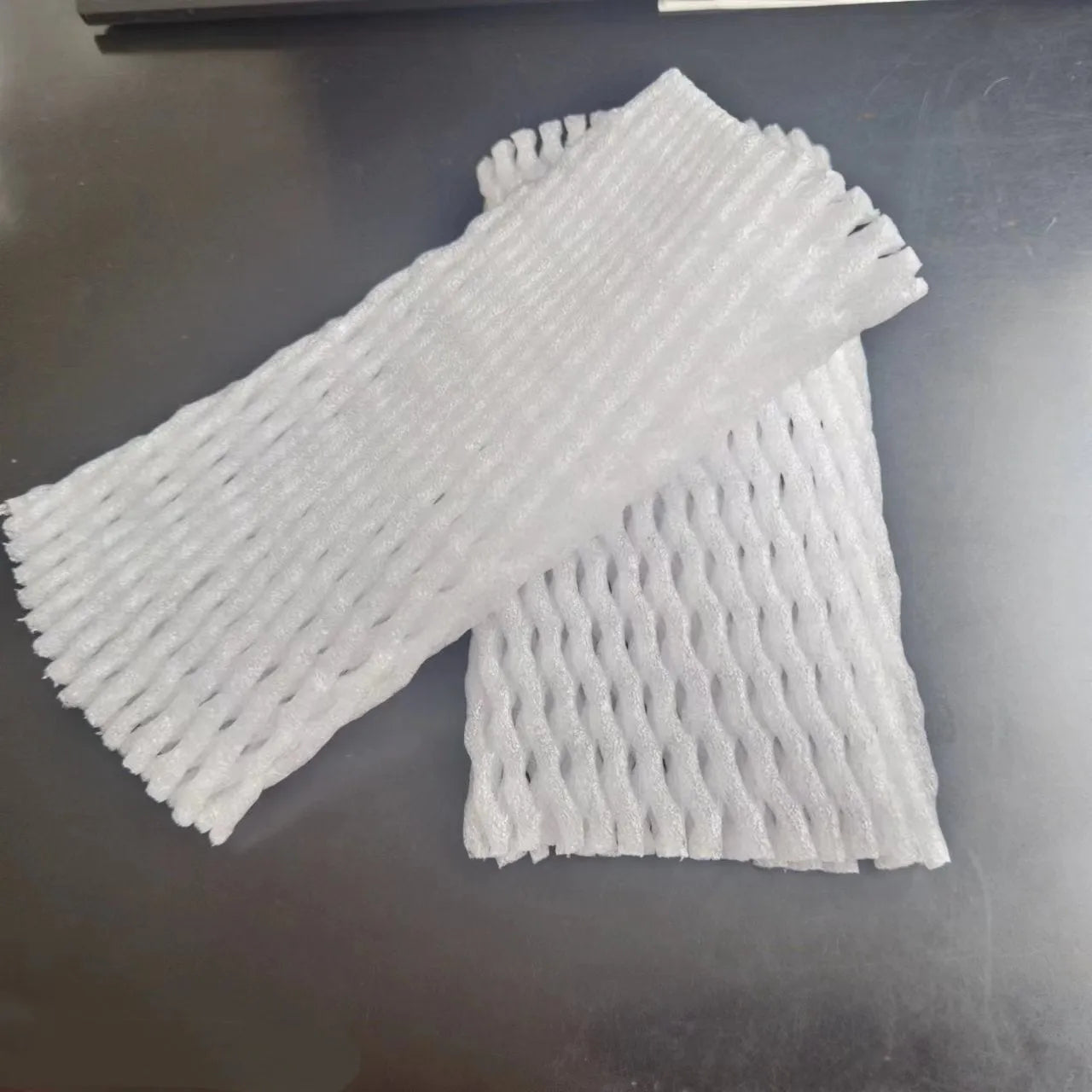 White foam net protective case showing net texture and available in multiple rectangular dimensions