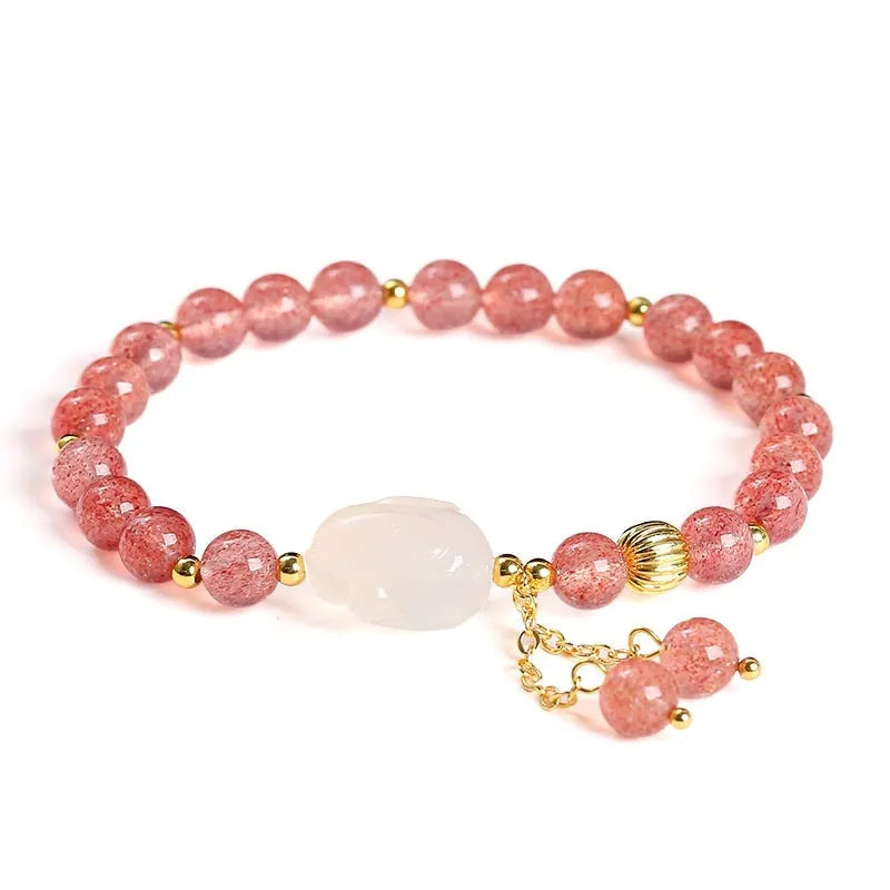 Women's white rabbit bracelet with 6mm round strawberry quartz agate beads in a geometric pattern.