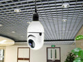 White ABS wireless WiFi bulb camera with 1080P resolution and shaking head mechanism for indoor home security monitoring.
