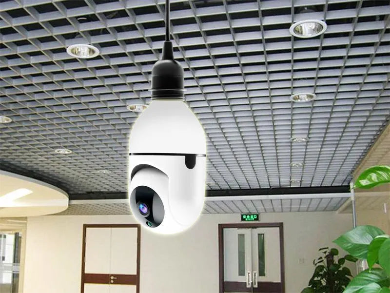 White ABS wireless WiFi bulb camera with 1080P resolution and shaking head mechanism for indoor home security monitoring.