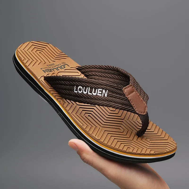Men's black flip flops with non-slip sole and EVA upper on a beach background