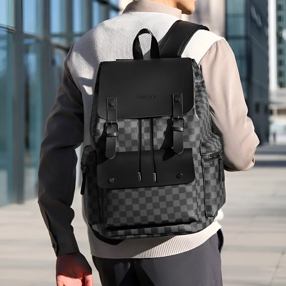 Men's plaid backpack in black and brown PU with curved shoulder straps for commute and business travel