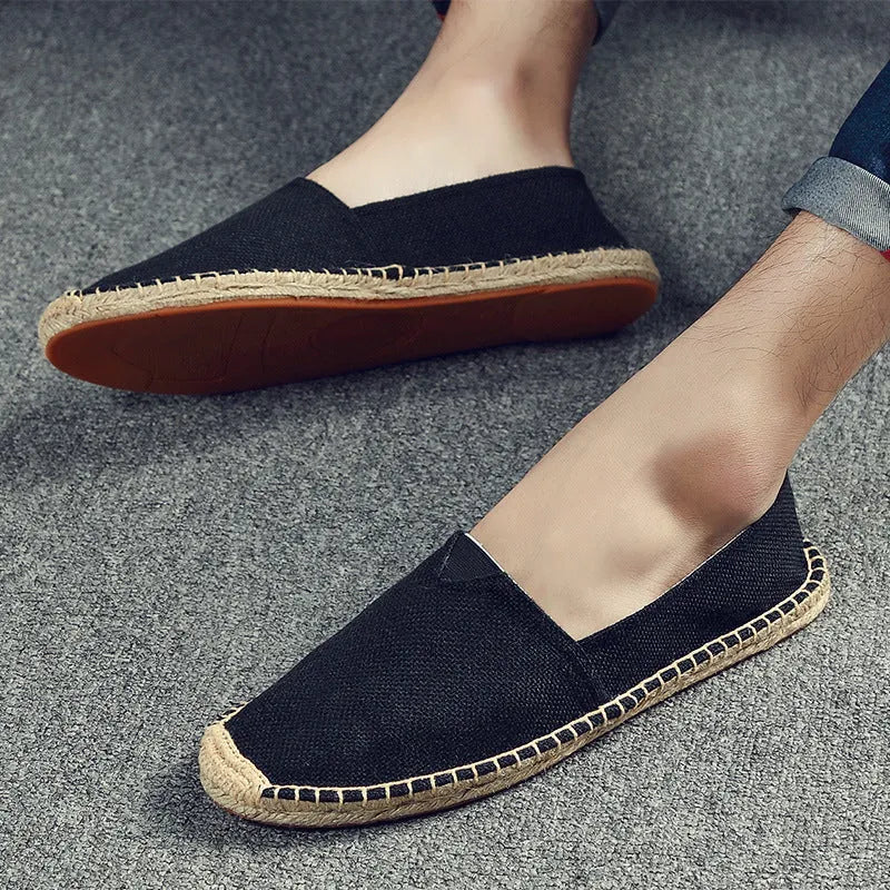 Men's round-toe canvas lace-up casual shoes in solid colours on a white background.