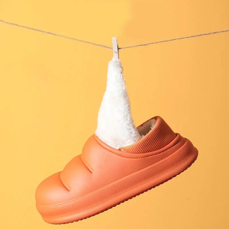 Women's waterproof winter house slippers in various colours with EVA construction and non-slip sole