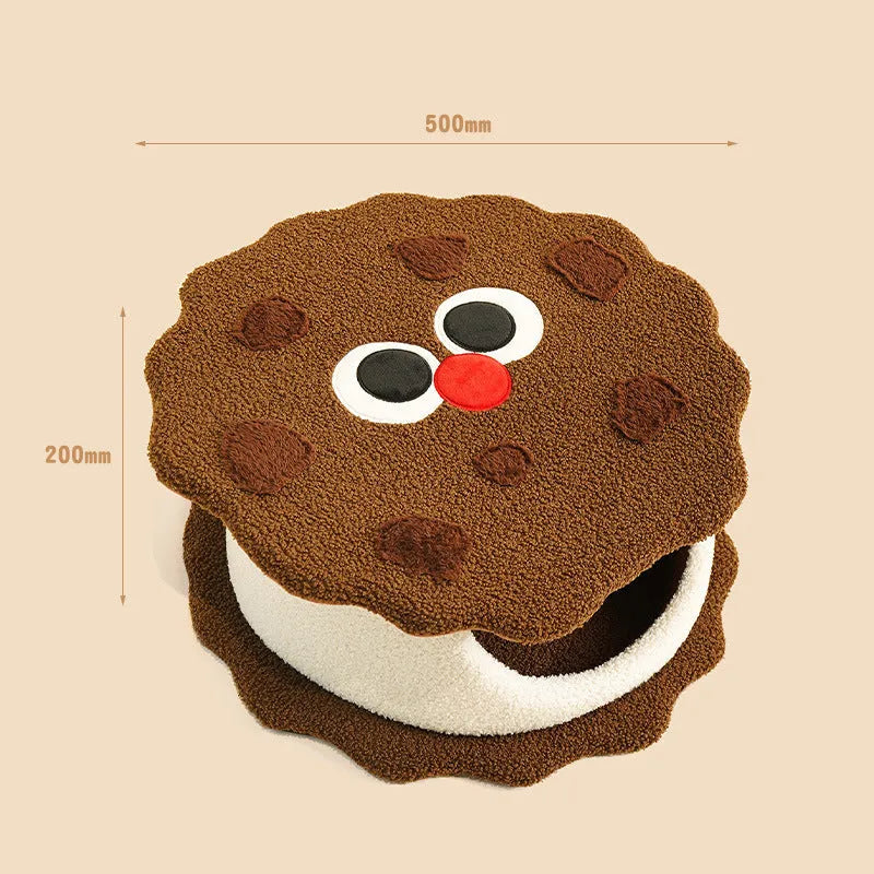 Khaki coloured sandwich cookie shaped closed cat bed house with front entrance and removable cushion