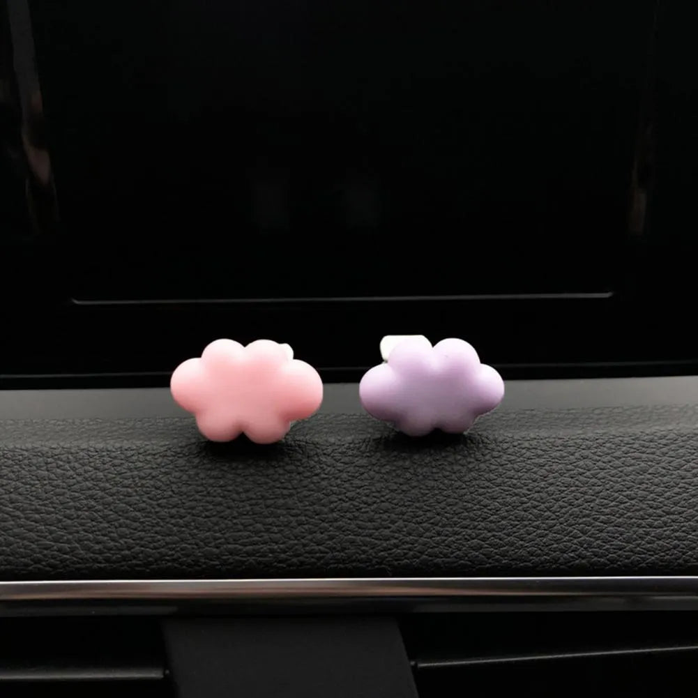 Baiyun cartoon resin car air vent fragrance clip in six colour options on a vent.