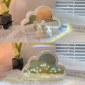 Cloud-shaped tulip night lamp with LED lights and integrated mirror on a table