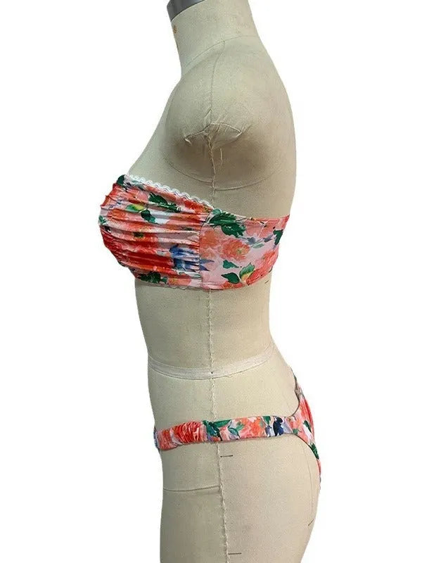 Women's floral printed lace-trim bikini set in blue, shown front and back.
