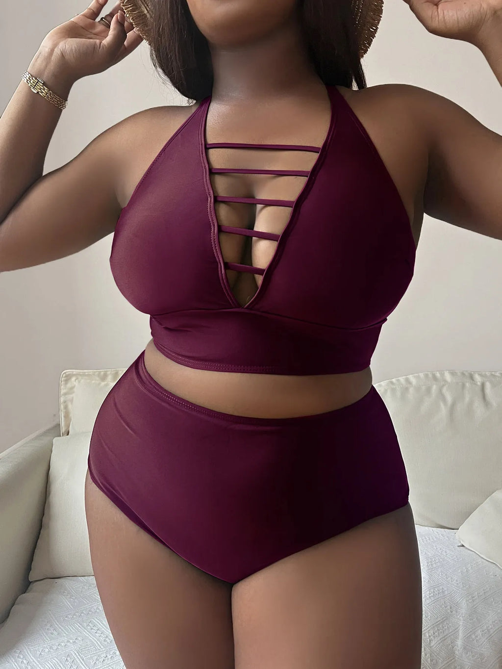 Plus size women's black bikini with adjustable halter top and high waist briefs