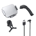 Grey and white car wireless charging phone holder with vent clip and suction cup mount on a dashboard.