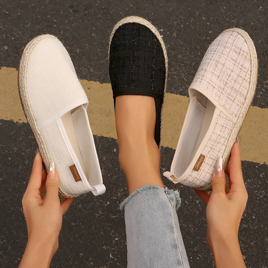 Casual fisherman shoes with canvas upper and rope sole bottoms in black, white and beige colours