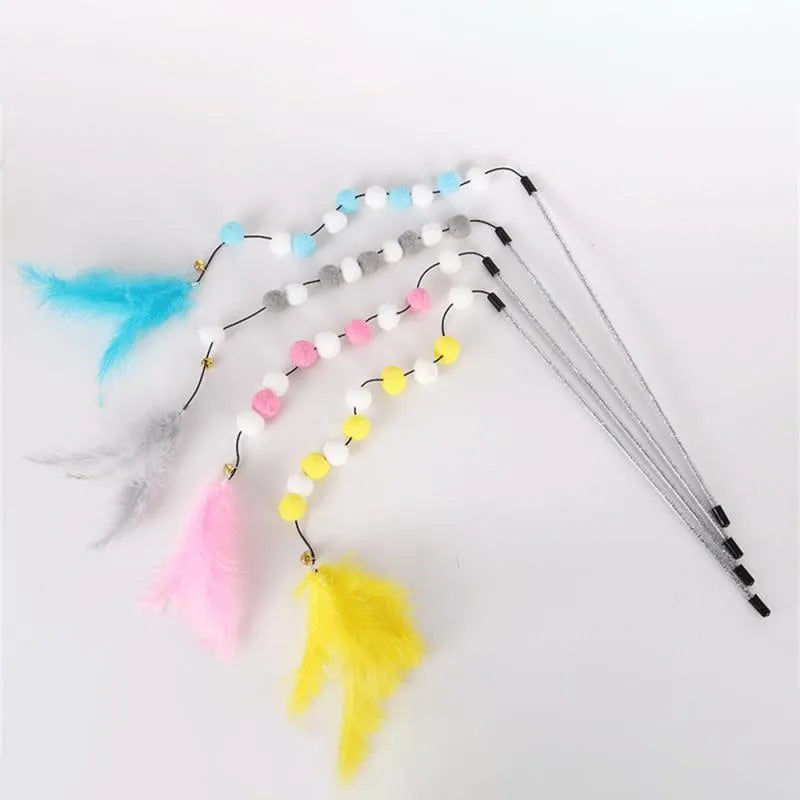 A 31cm long cat teaser toy stick with a colourful pompon, feathers, and a bell.