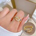 Devil's Eye open copper ring with electroplated finish, geometric eye design, shown in red, blue and white options