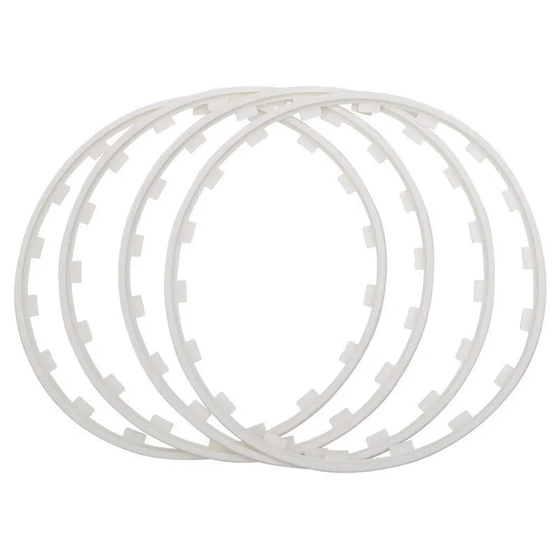 Set of four coloured nylon wheel hub protection rings for anti-rub defence.
