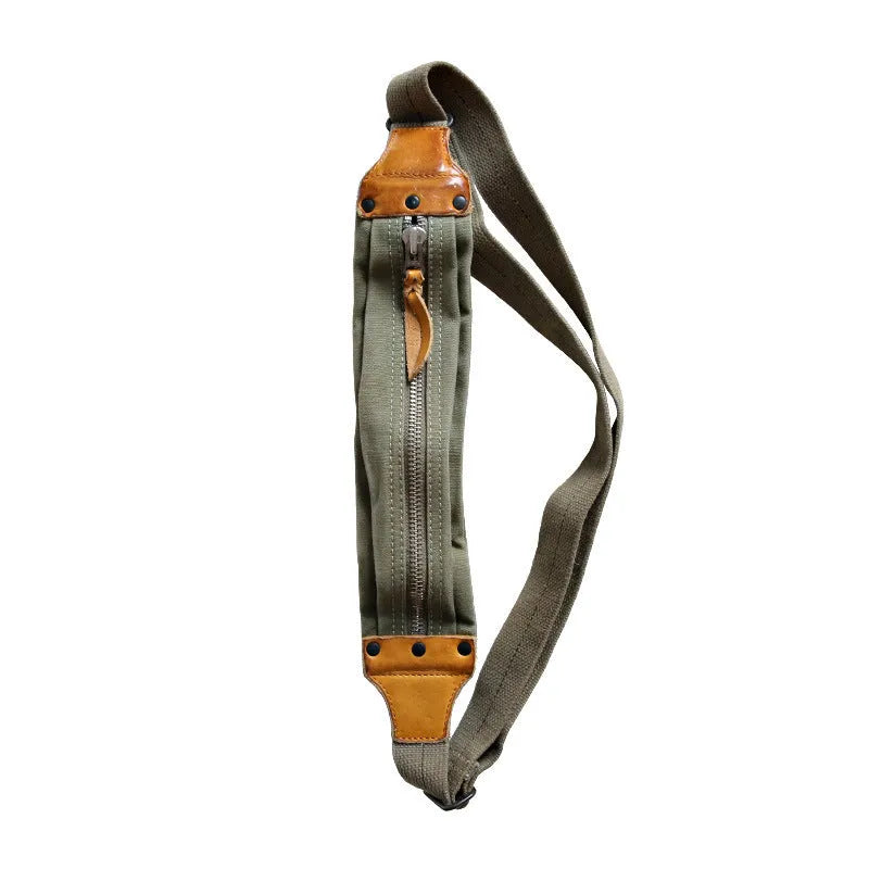 Green military style chest bag made from washed canvas with Italian cowhide leather trim