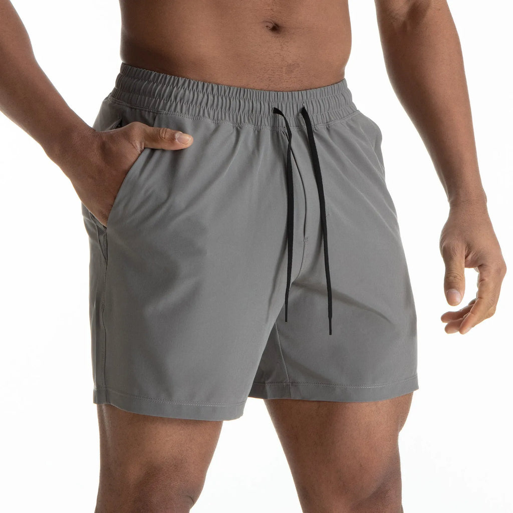 Men's black quick-dry sport shorts with white contrast mesh stitching on the sides.