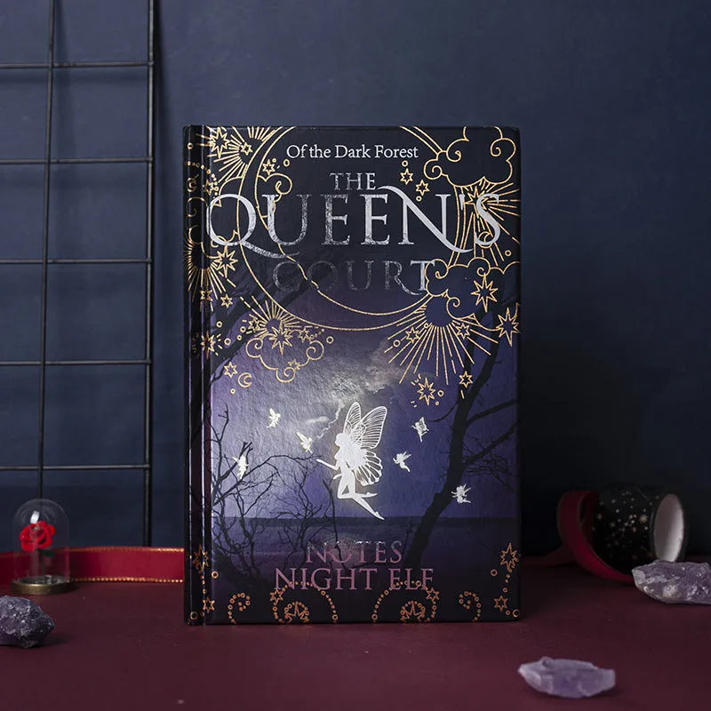 Blue A5 hardcover notebook with luminous fluorescent cover, open to show full-colour illustrated pages.