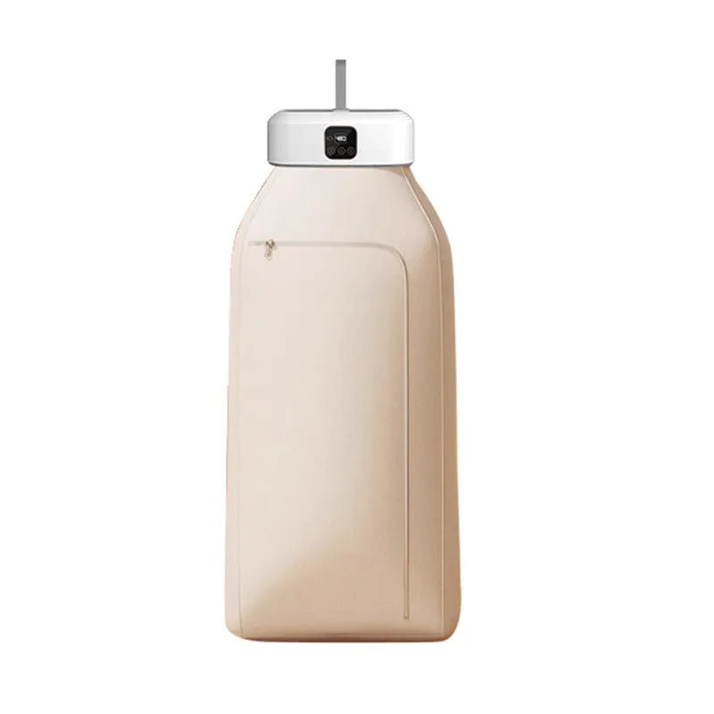 White cylindrical laundry dryer with remote control on countertop showing compact 29cm height